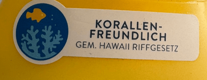 Label Korallenfreundlich gem. hawaii riffgesetzt auf einer Sonnencreme Verpackung