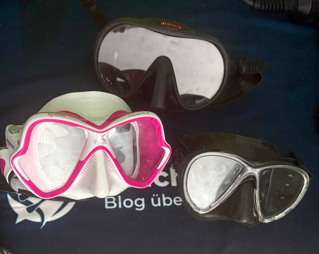 Pinkt weiße Mares Tauchmaske nebne Hollis M1 und Cressi Big Eyes