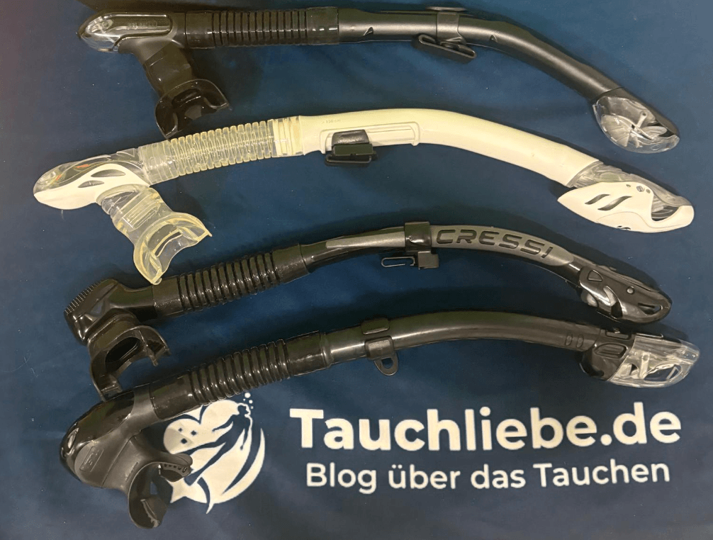 4 Schnorchel liegen nebeneinander zum Größenvergelich