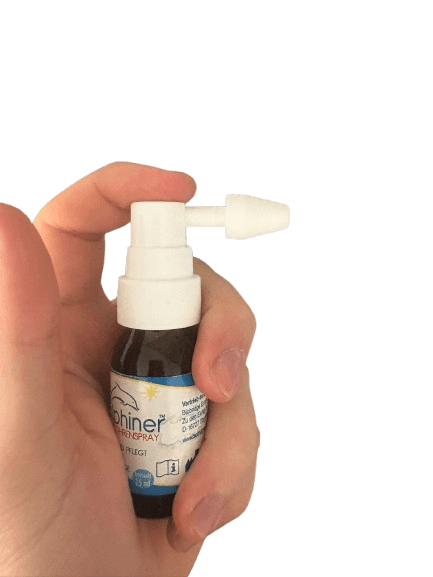Finger betätigt Druckknopf des Ohrensprays