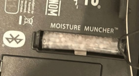 Moisture Muncher Fläschchen mit weißen Kugeln zur Feuchtigkeitsbindung